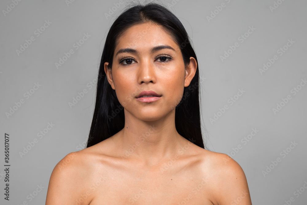Portrait of young beautiful Asian woman shirtless Portrait of young beautiful Asian woman shirtless