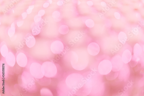 Abstract pink and peach color bokeh blur background with copy space