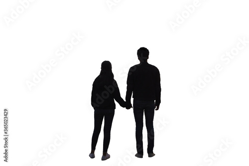 Young couple holding hands with standing