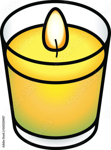 A votive candle in a glass container.