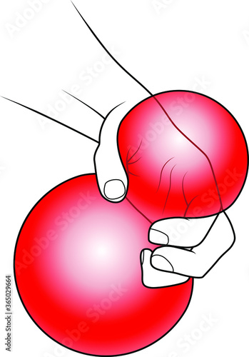 Hand squeezing a balloon or rubber ball.