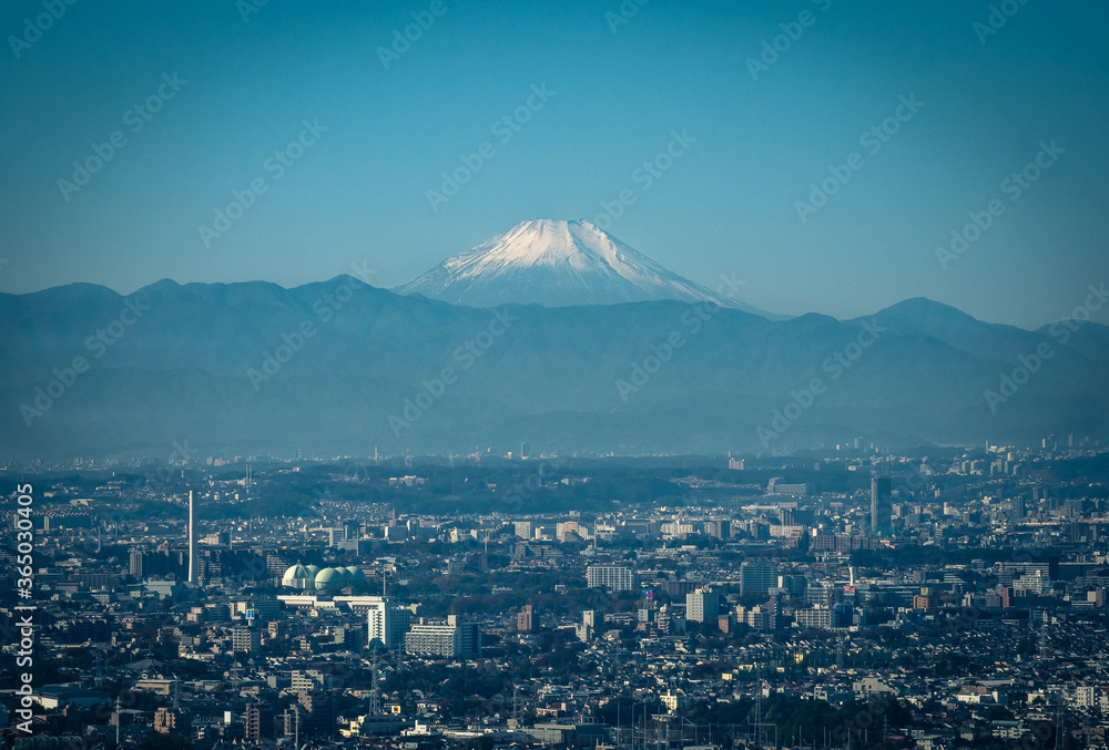Mount Fuji is seen from Tokyo on a clear day.