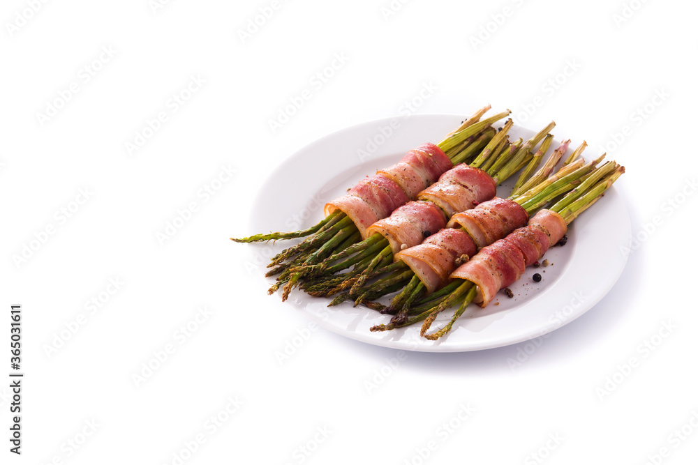 Green asparagus wrapped with bacon isolated on white background.Copy space