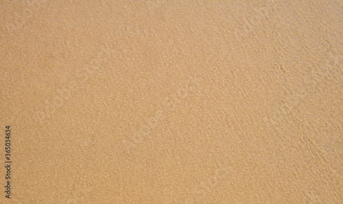 Fondo de arena de playa con agua de mar