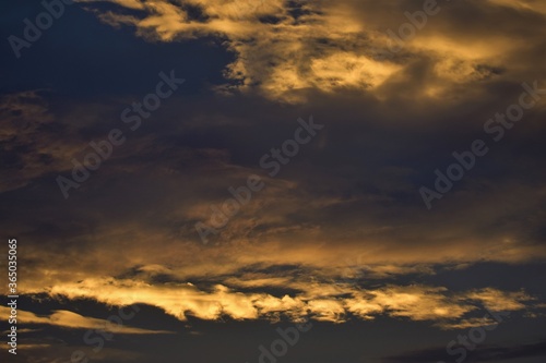 Fototapeta Naklejka Na Ścianę i Meble -  clouds during sunset during summer 