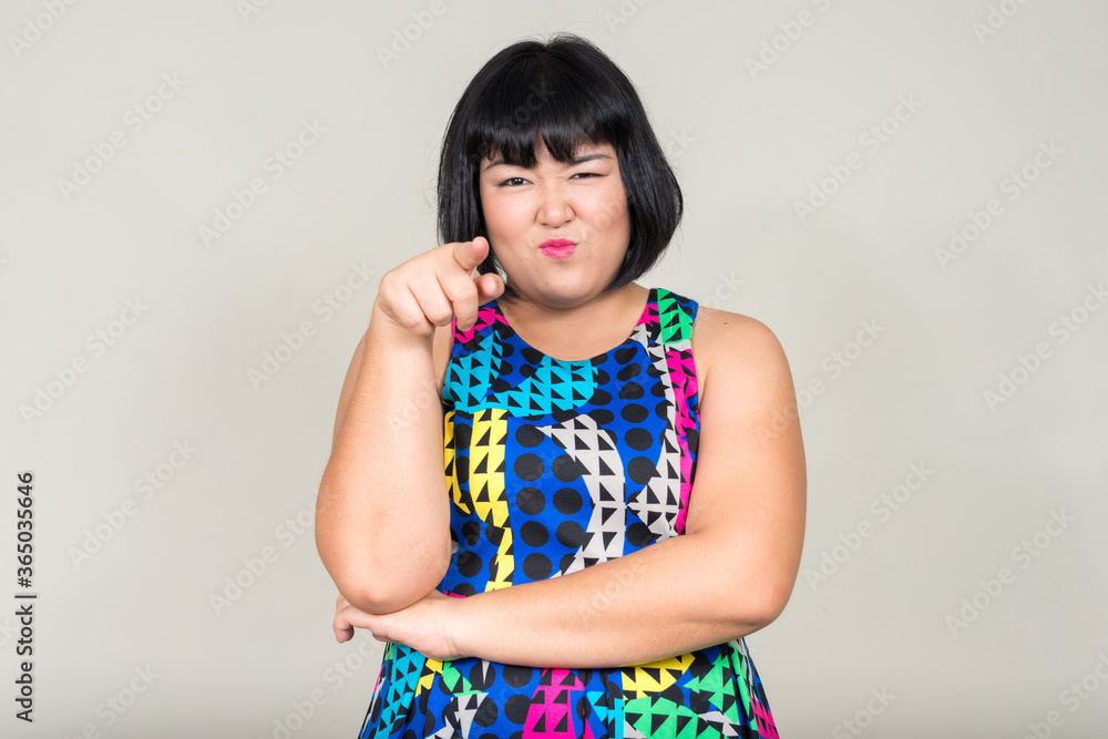Portrait of young beautiful overweight Asian woman Portrait of young beautiful overweight Asian woman