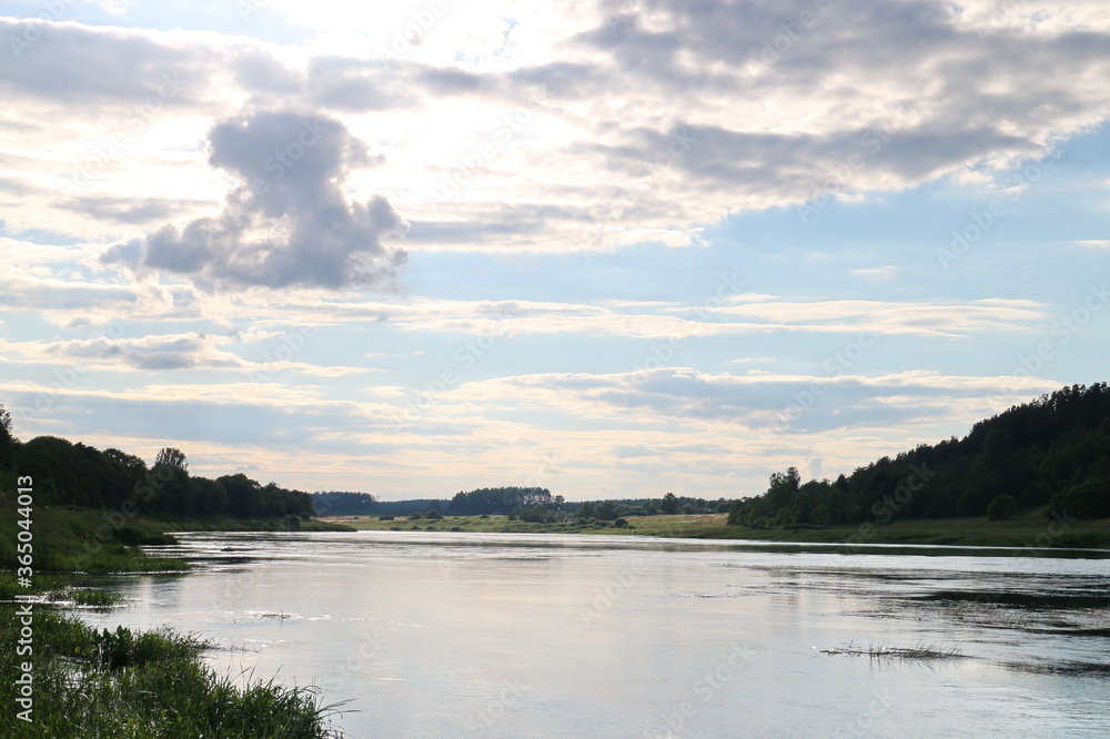 Sunny day on the river in the countryside