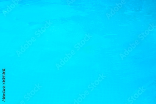 Water surface in country pool. Summer concept.