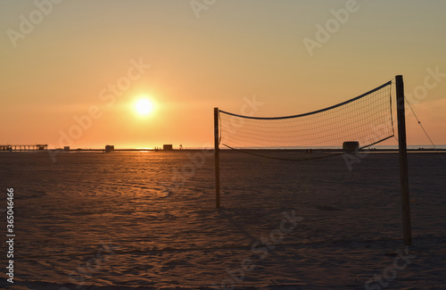 Beach Volleyball Court Net at Sunrise