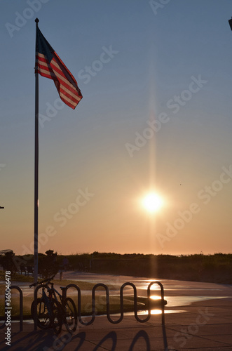 American Flag at Sunrise over Atlantic Ocean