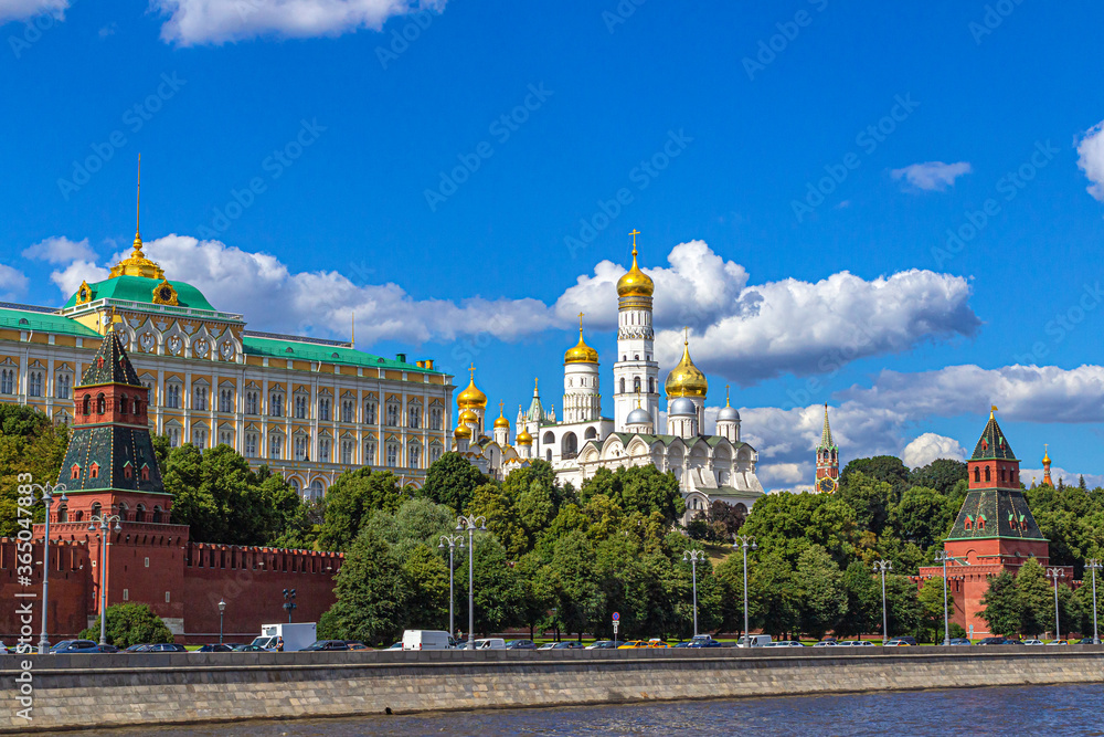 View of the Kremlin embankment and the Kremlin with palaces, towers and churches