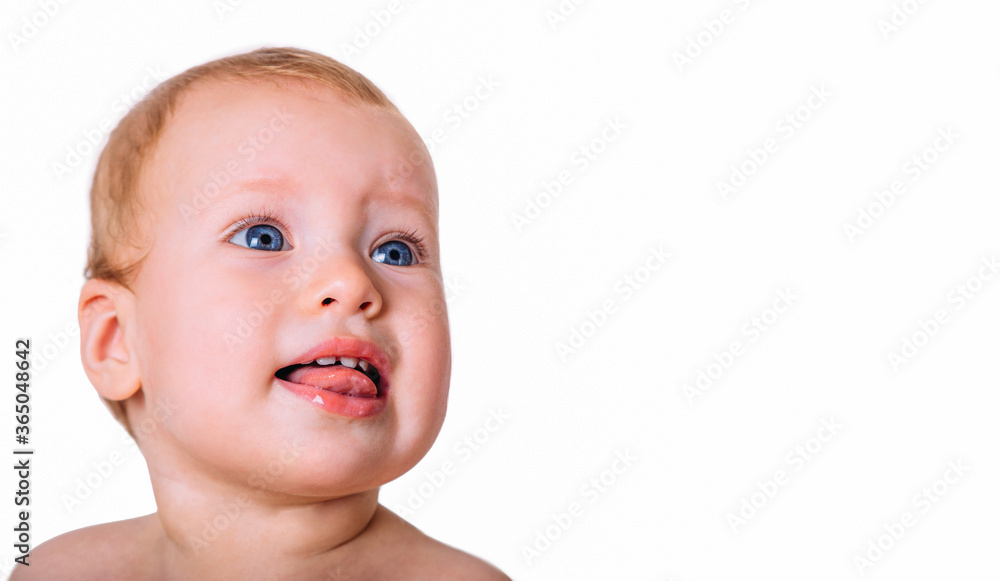 Portrait of a little cute baby looking up in surprise and joy. Portrait of a little cute baby looking up in surprise and joy.