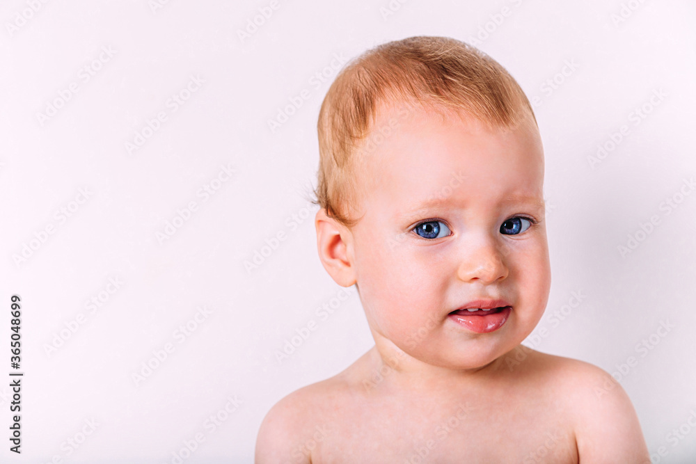Portrait of a little cute kid looking at the camera. Portrait of a little cute kid looking at the camera.