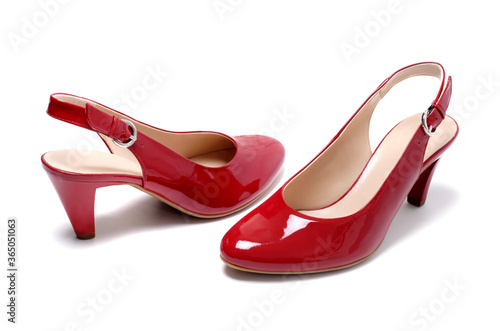 Pair of red high heel shoe isolated on white. Studio shot