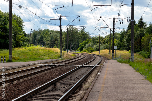 Railway electrified road leading to the city.