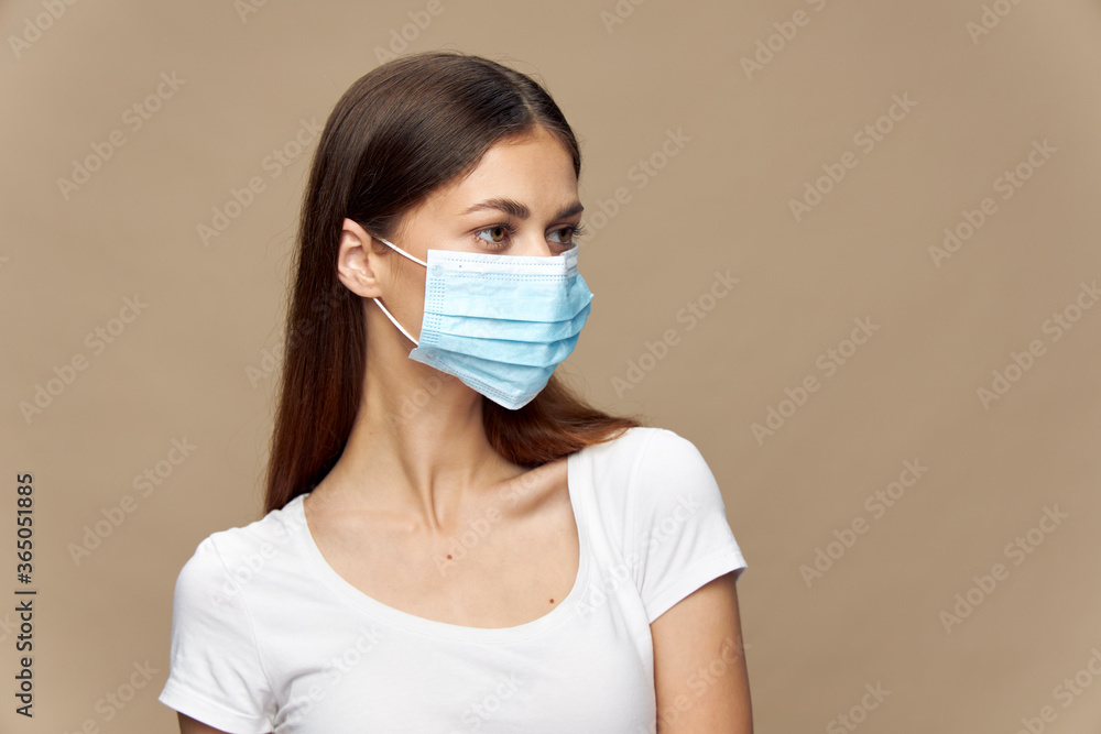Beautiful girl fashion clothes in a protective mask Beautiful girl fashion clothes in a protective mask