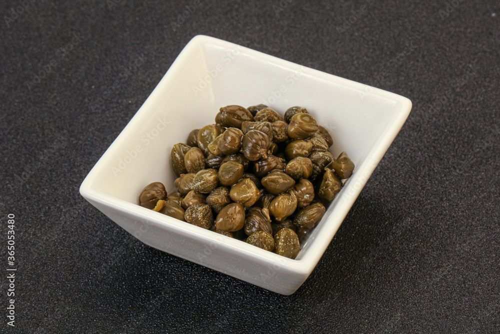 Tasty capers in the bowl Tasty capers in the bowl