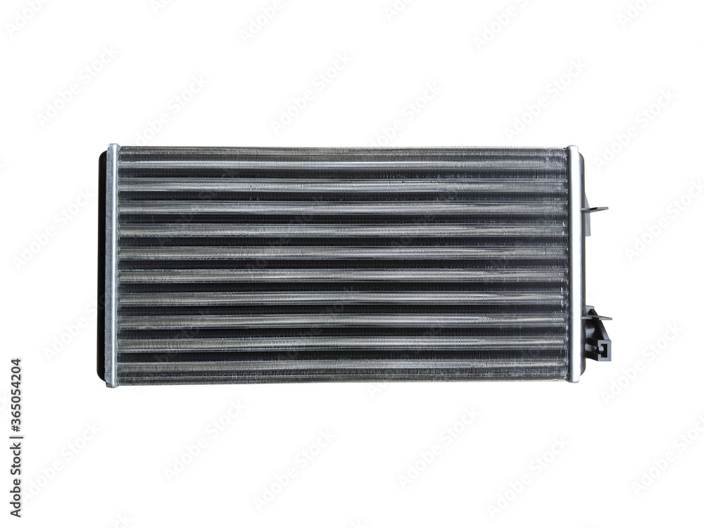 Heater core of the car on an isolated white background. New spare parts. Heater core of the car on an isolated white background. New spare parts.