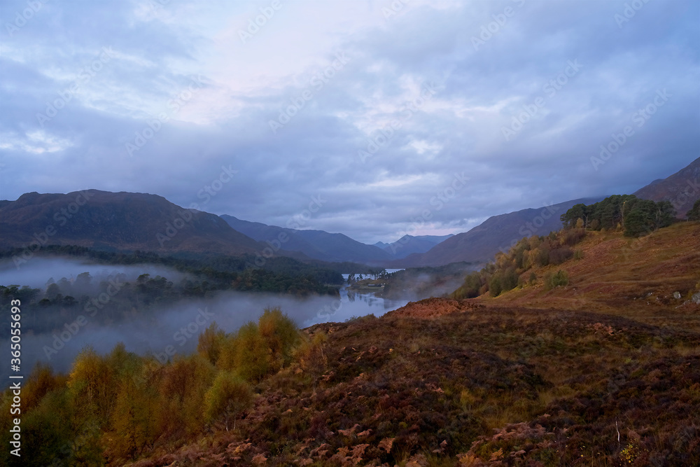 A moody misty morning in Glen Affric south west of the village of Cannich in the Highlands of Scotland passing through Loch Affric and Loch Beinn A' Mhedion