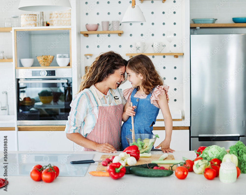 daughter mother kitchen food preparing cooking child bonding happy girl together home parent daughter mother kitchen food preparing cooking child bonding happy girl together home parent