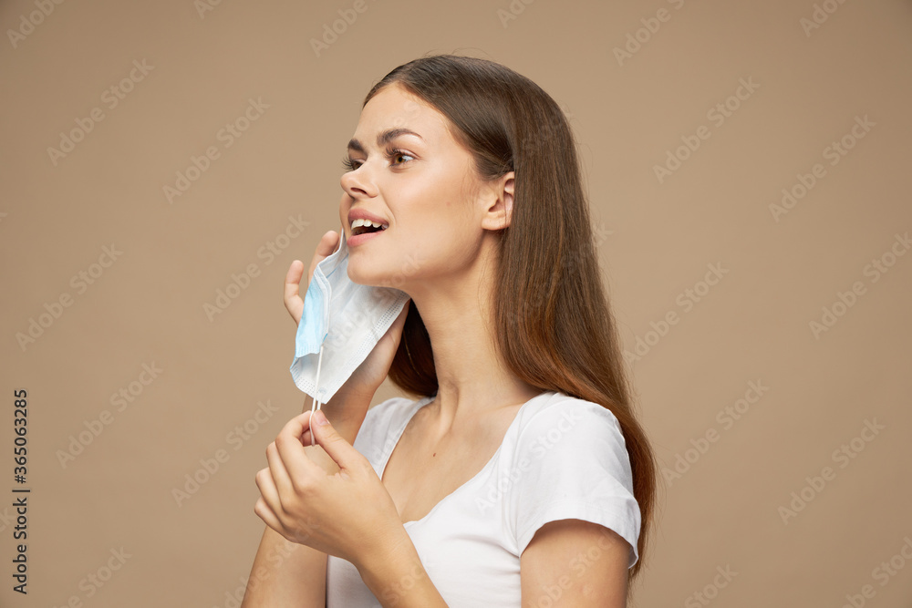Model stylish clothes in a medical mask allergy pollution Model stylish clothes in a medical mask allergy pollution