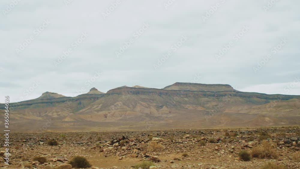 Beautiful panoramic rocky landscape, Stones and rocks in a color canyon in Morocco, cloudy sky, 4k Beautiful panoramic rocky landscape, Stones and rocks in a color canyon in Morocco, cloudy sky, 4k