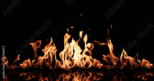 Beautiful bright fire flames on black background