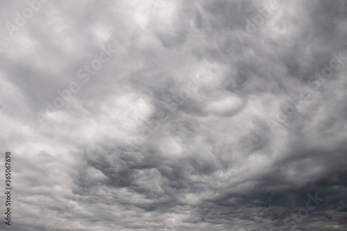 Dramatic gray clouds in the rainy sky