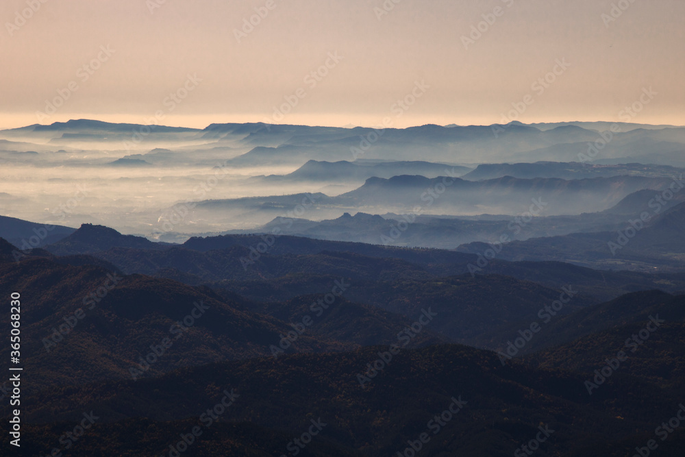 layers of mountains among the mist