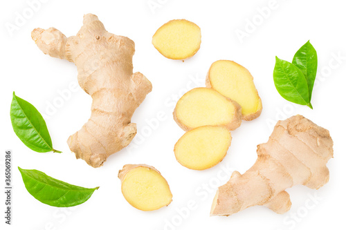 ginger roots with slices and green leaves isolated on white background. Top view