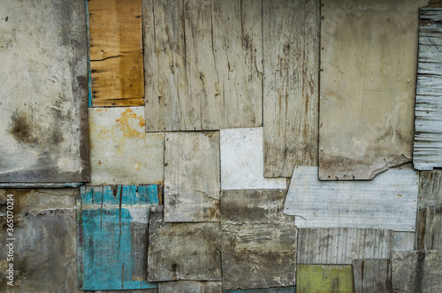 Background of the old plywood patchworked wall © Igor Pyekhtyeryev