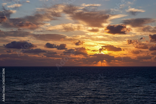 A colorful sunrise over the Atlantic ocean © Joni