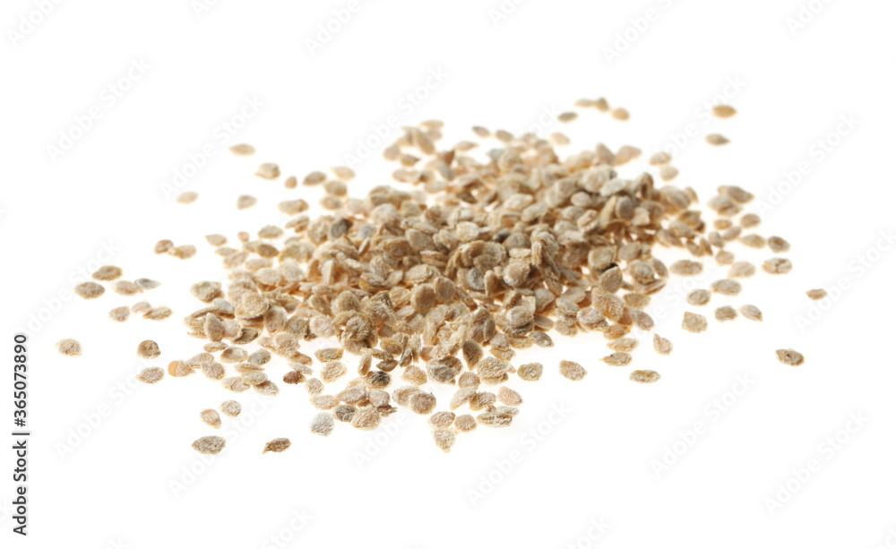 Pile of raw tomato seeds on white background. Vegetable planting