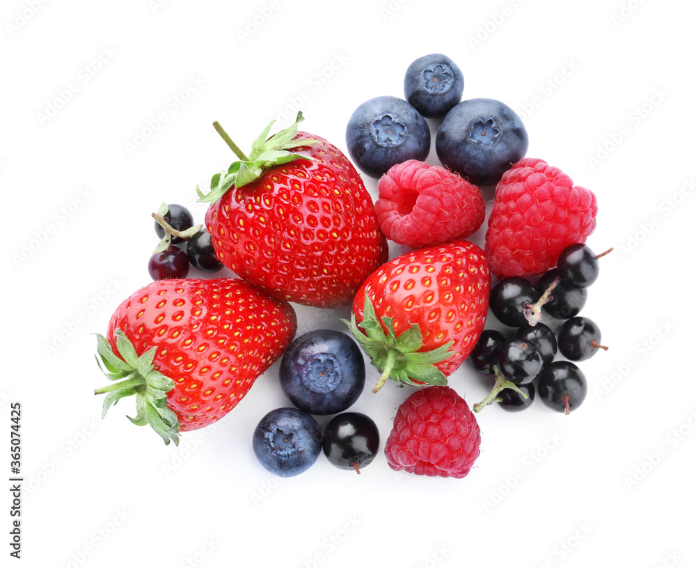 Pile of different ripe tasty berries isolated on white, top view Pile of different ripe tasty berries isolated on white, top view