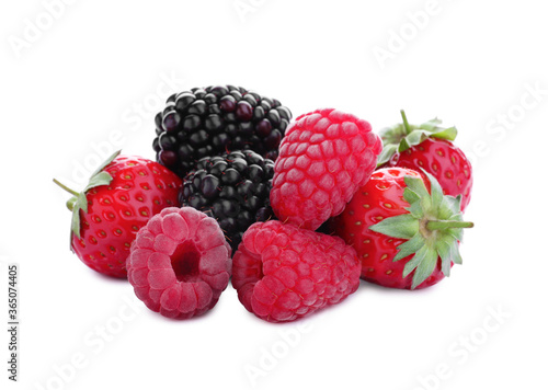 Pile of blackberries, raspberries and strawberries isolated on white