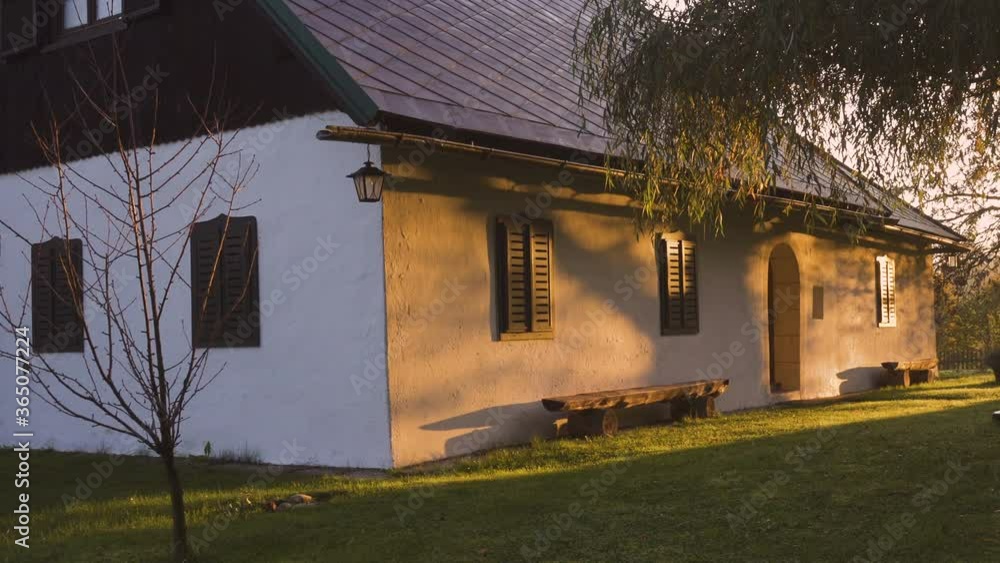 small rural austrian residential house illuminated by the rays of morning sun at the beginning of quite autumn day
small rural austrian residential house illuminated by the rays of morning sun at the beginning of quite autumn day