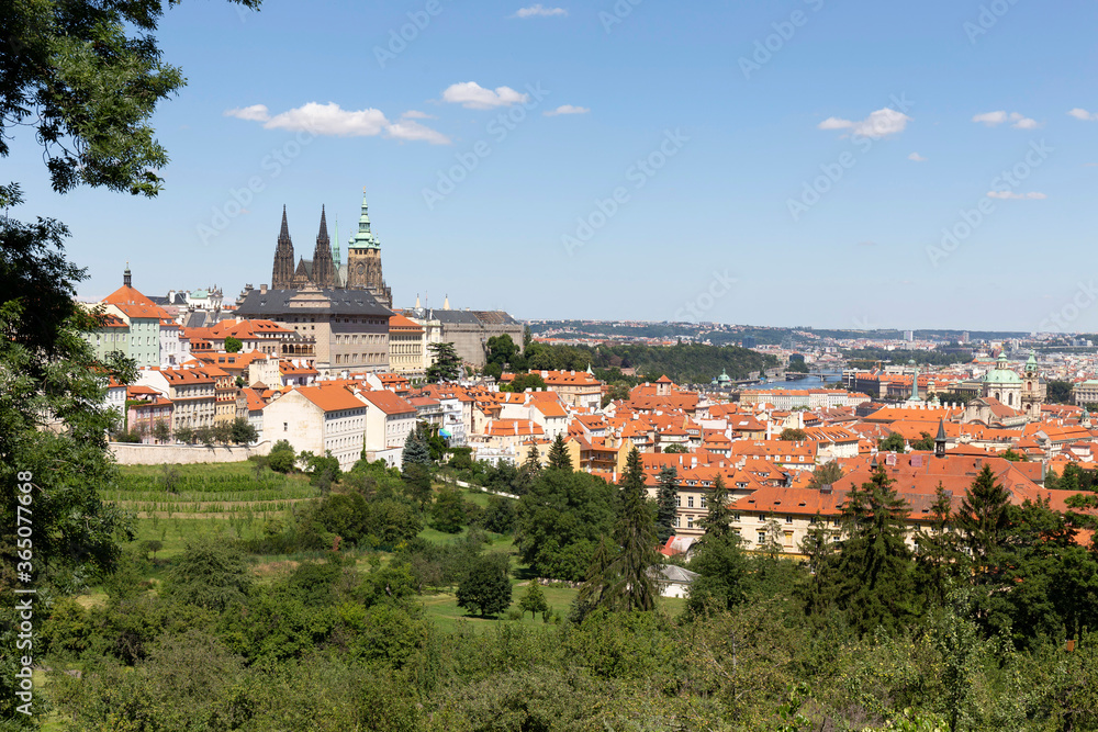 Prague City with gothic Castle and the green Nature from the Hill Petrin, Czech Republic