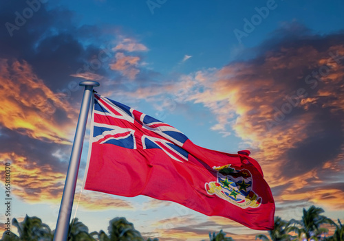 The Cayman Islands Flag flying against Blue Sky photo