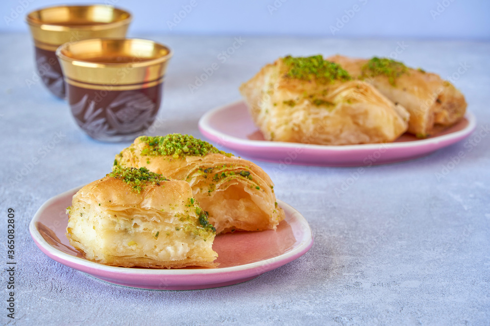 Sweets arabic dessert knafeh with pistachio and cheese