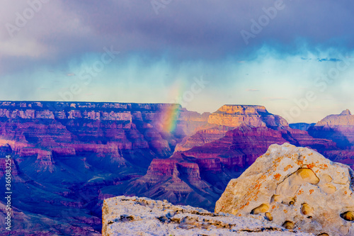Panoramic image of the colorful rainbow over the Grand Canyon in Grand Canyon National Park from the south rim part,Arizona,USA, sunset on a sunny cloudy day with blue sky