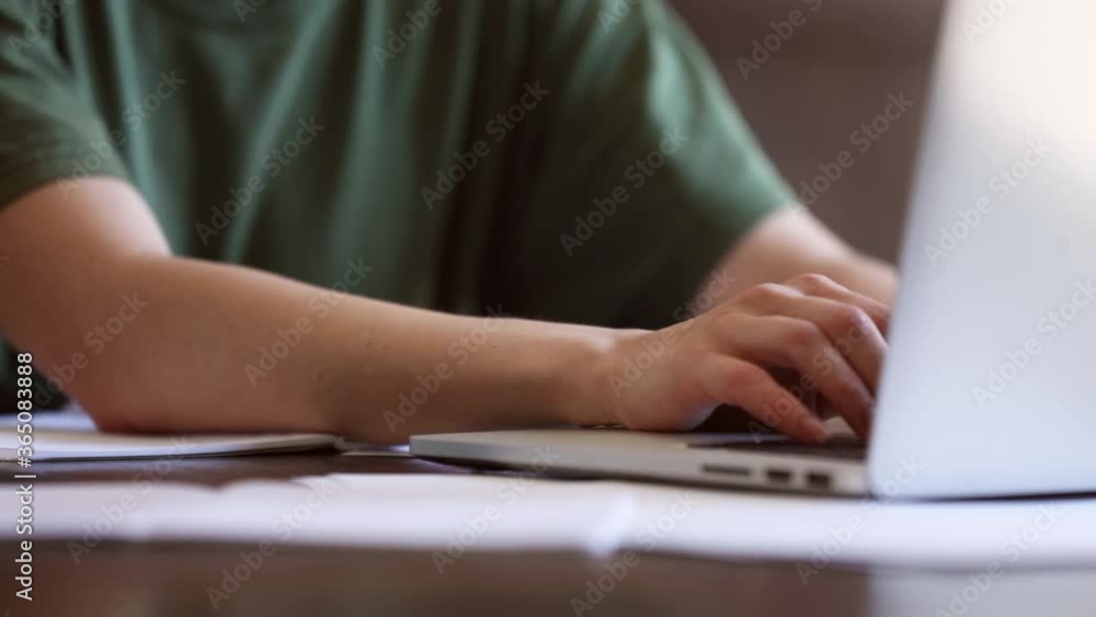 girl is working with notebook at home as freelancer