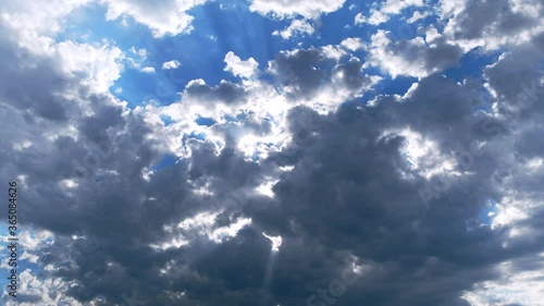 Blue Sky with Sun Ray Clouds