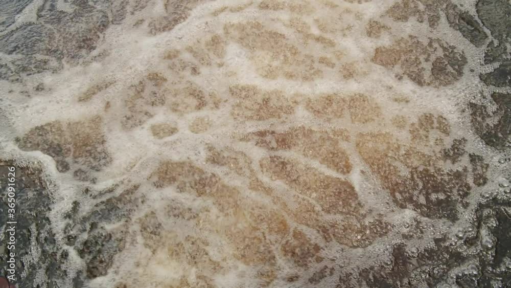 close up of churning and bubbling river current close up of churning and bubbling river current