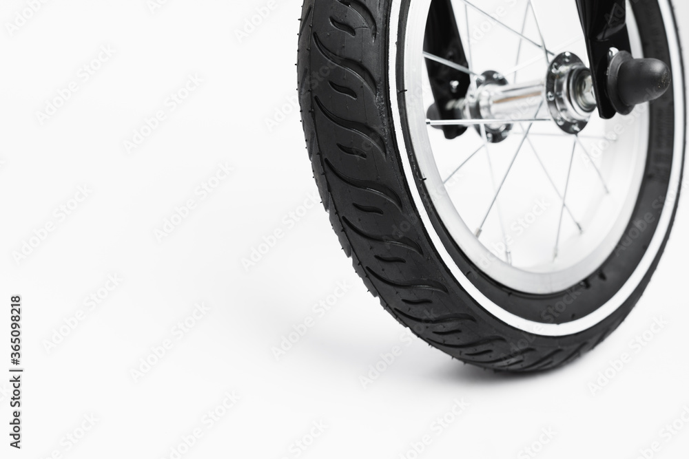 part of kids bicycle wheel with spokes, white background part of kids bicycle wheel with spokes, white background