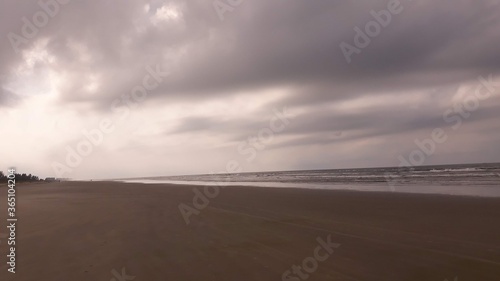 storm clouds on the beach © Felipe