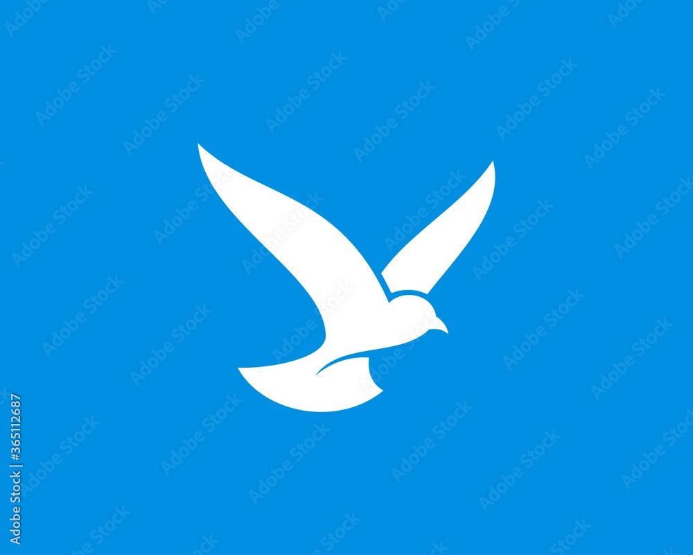 Simple abstract flying bird silhouette Simple abstract flying bird silhouette