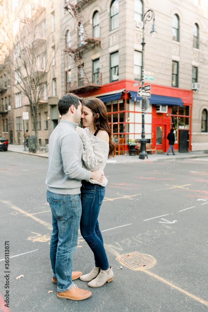 A young couple having a romantic moment in front of  famous 