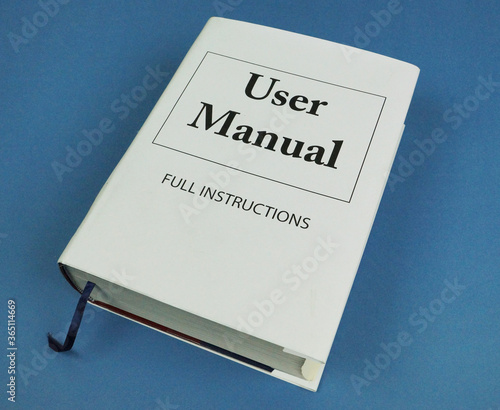 Large Book titled 'User Manual' suggesting that the task is very complicated.