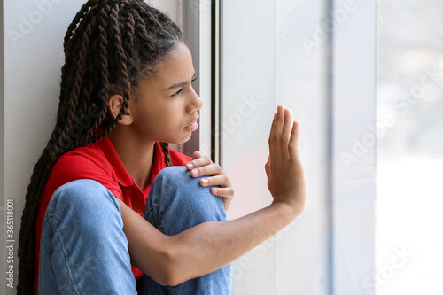 Sad African-American girl s...