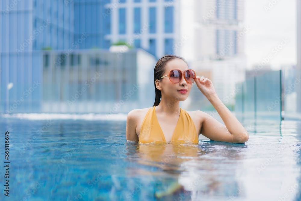 Portrait beautiful young asian woman relax leisure around swimming pool